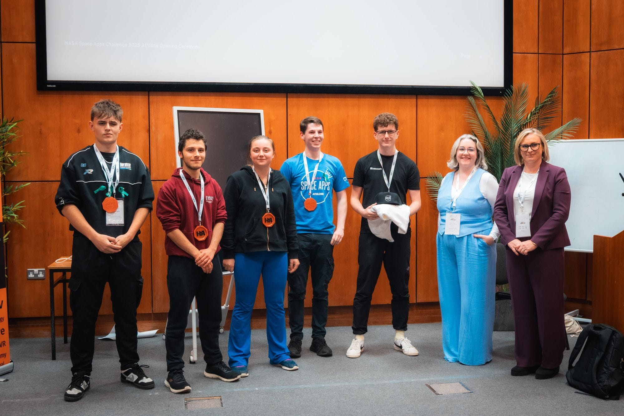 Team Debugonauts, third place at HackAthlone 2025, on stage after the awards